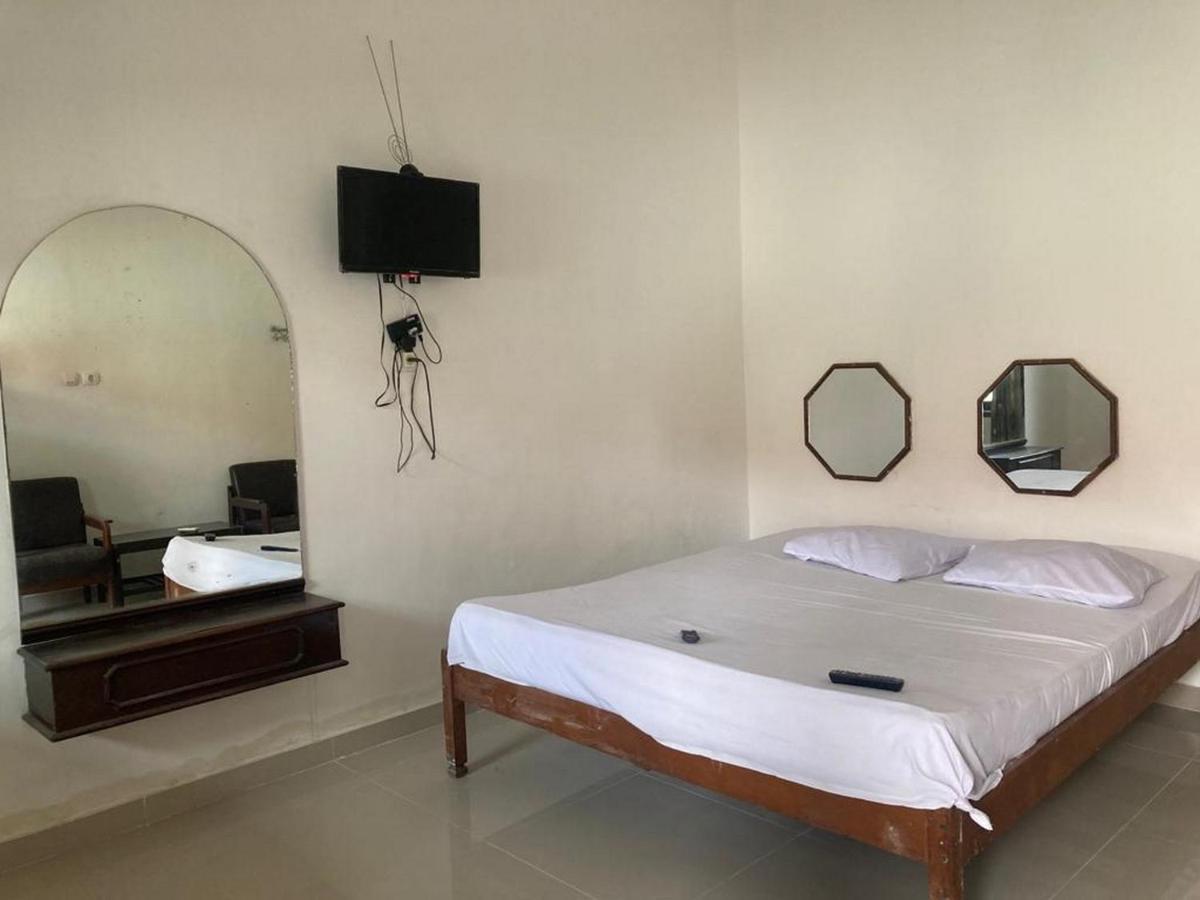 Hotel Surya Citra Jogja A Mitra Reddoorz Джокьякарта Экстерьер фото