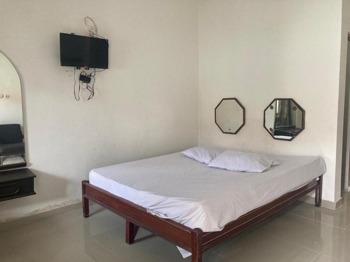 Hotel Surya Citra Jogja A Mitra Reddoorz Джокьякарта Экстерьер фото